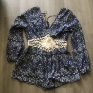 Flowy romper with crochet